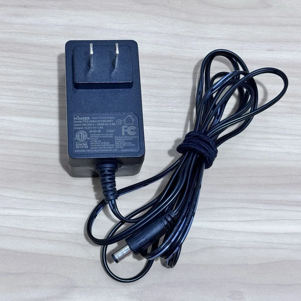 Minger Class 2 AC To DC Power Adapter Model TPQ-228A120150UW01 Output 12V 1.5A